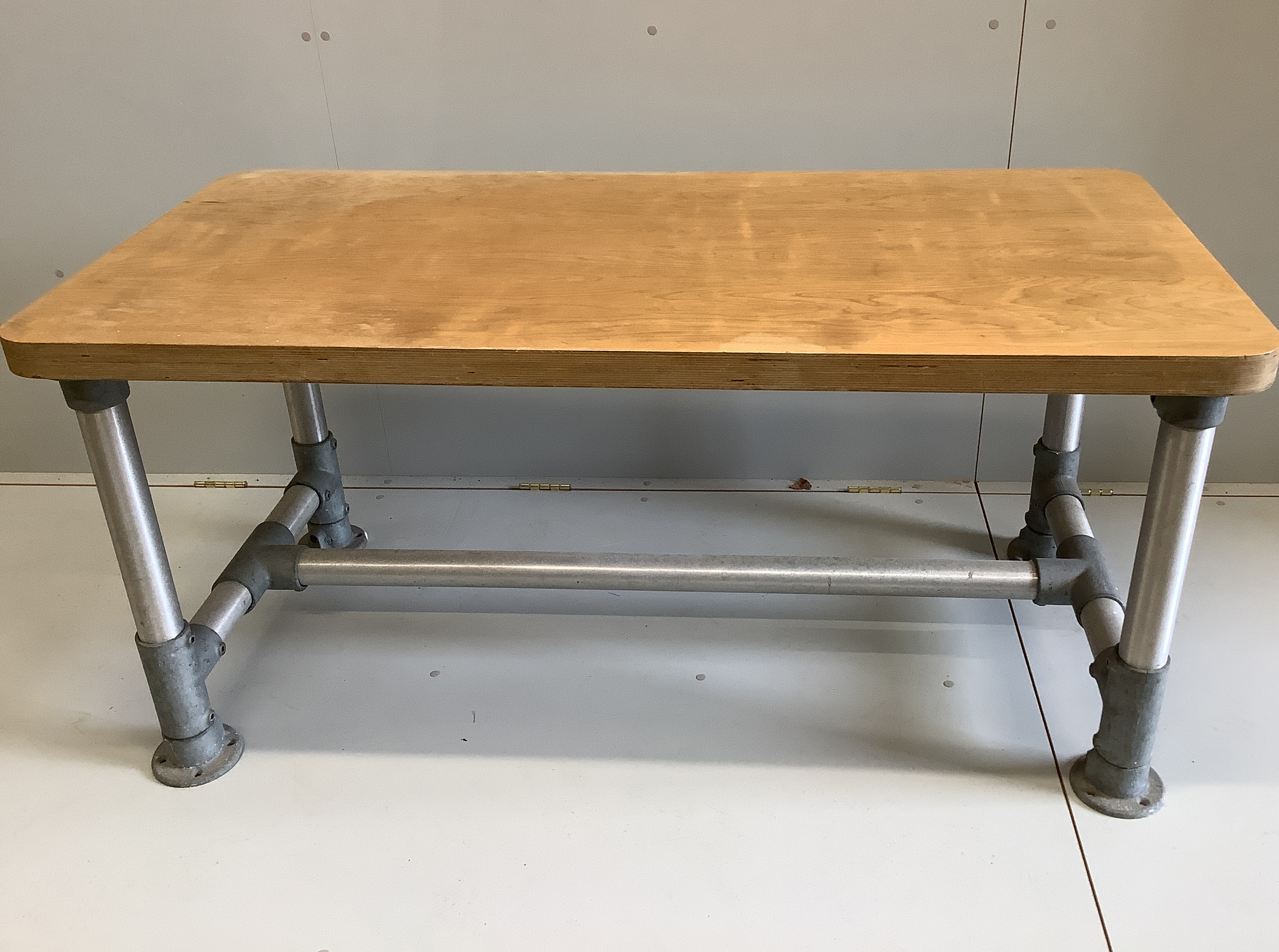 Wolff Olins. An industrial style rectangular table, circa 1970, width 150cm, depth 75cm, height 72cm